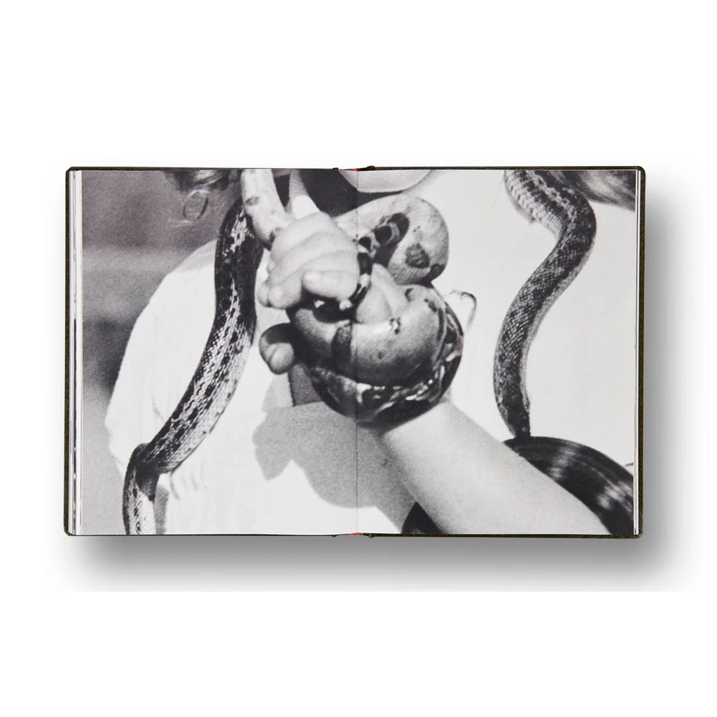 Girl Plays With Snake
